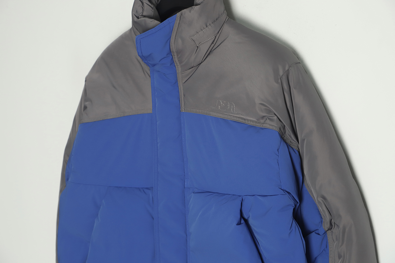 ADER 22Fw Contrast color asymmetric down jacket