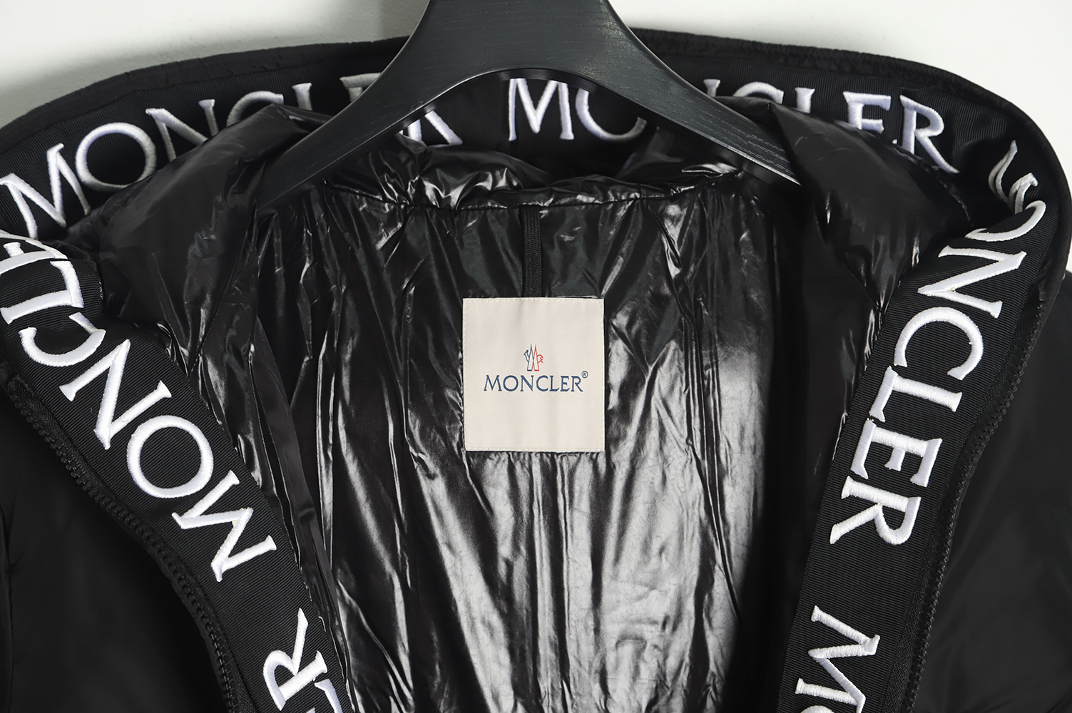 Moncler logo embroidered down jacket