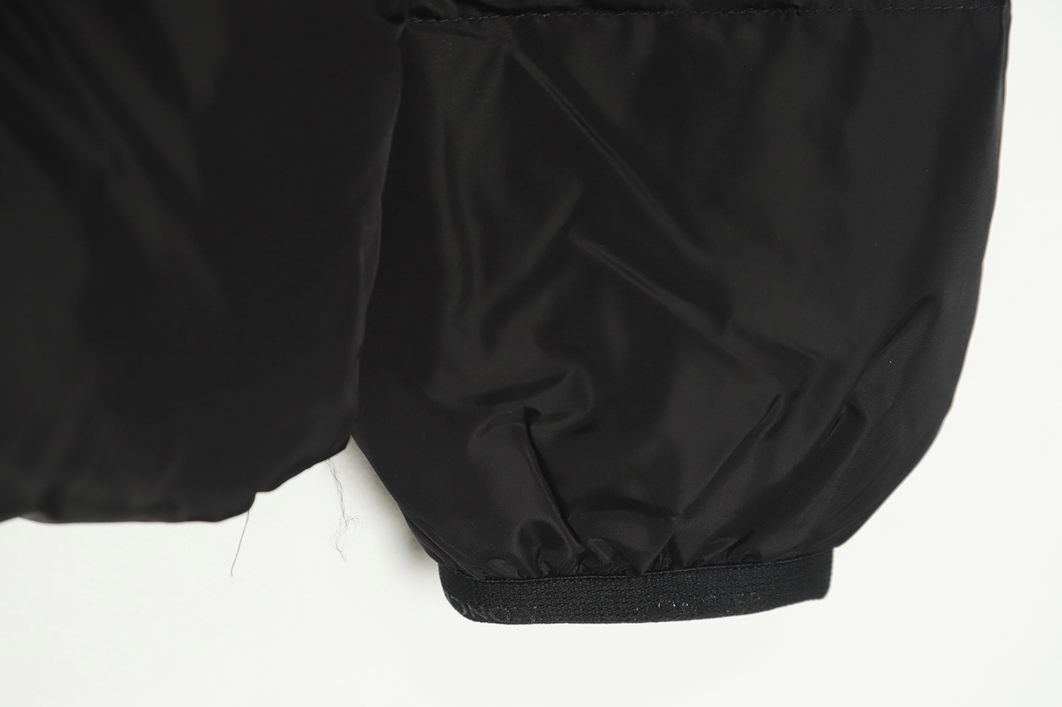 Moncler logo embroidered down jacket