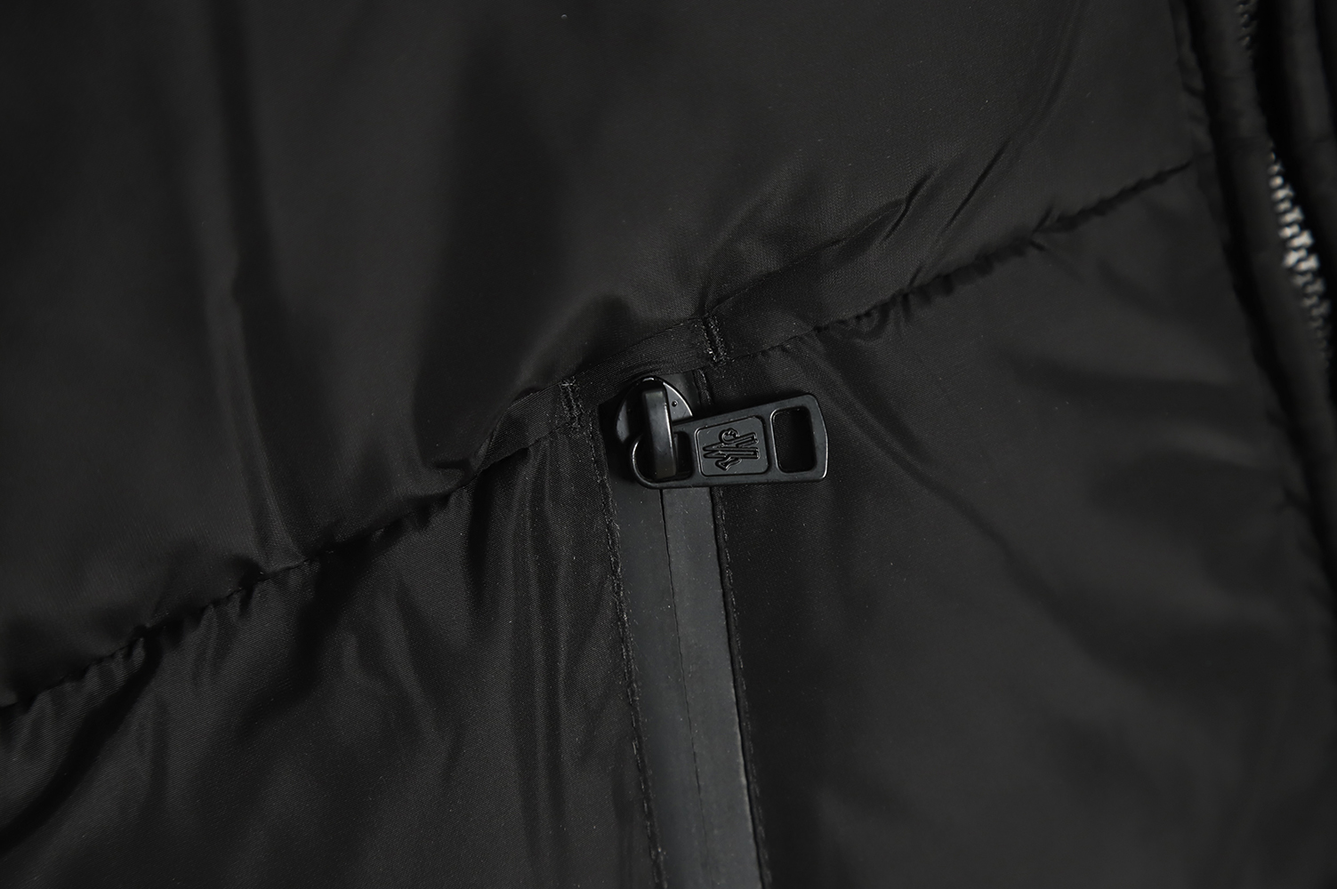 Moncler logo embroidered down jacket
