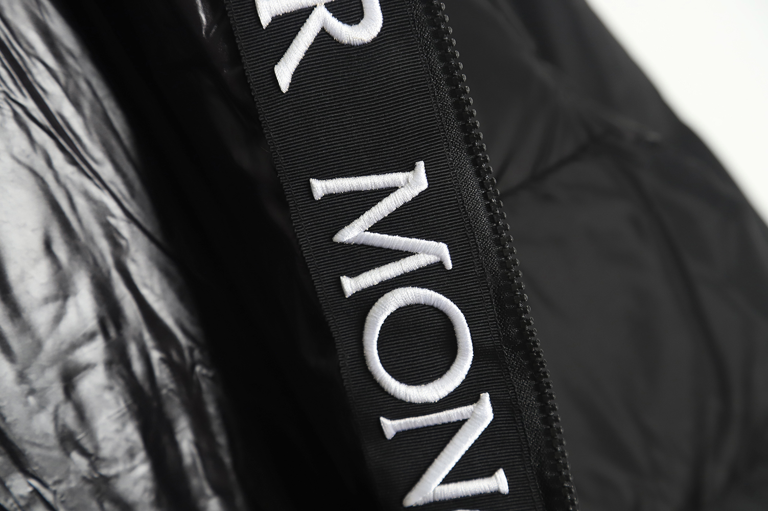 Moncler logo embroidered down jacket