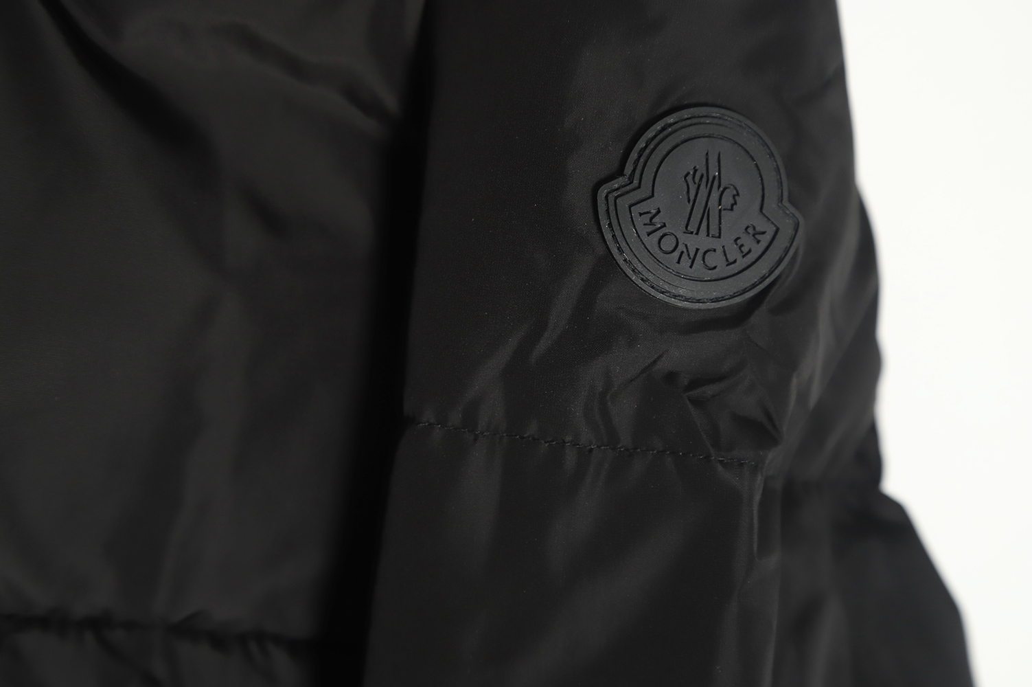 Moncler logo embroidered down jacket