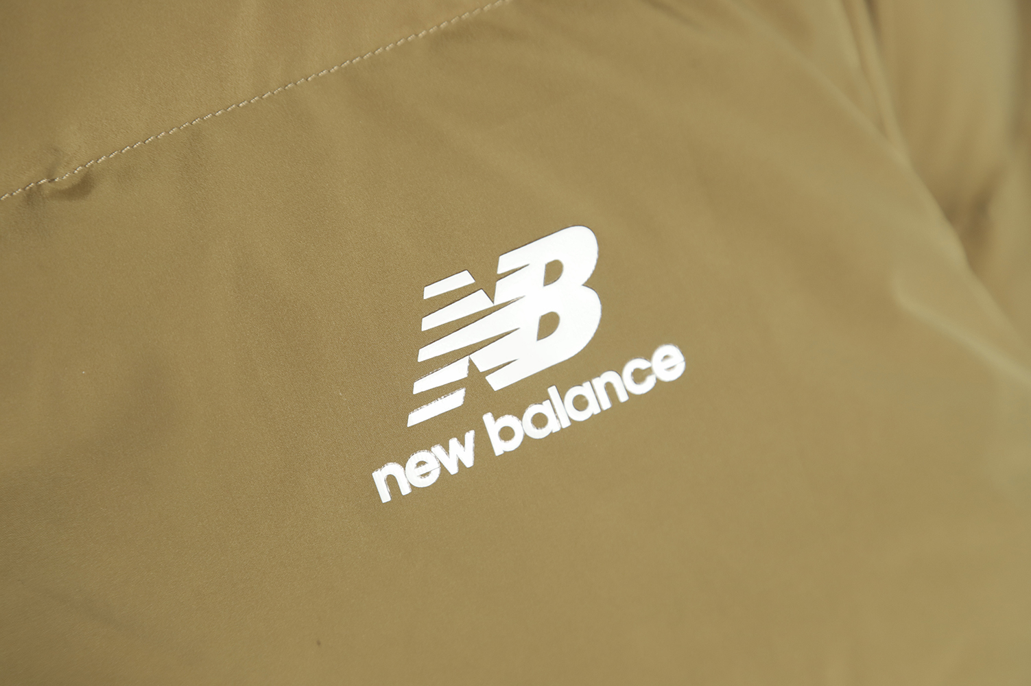 New Balance solid color down jacket with large pockets