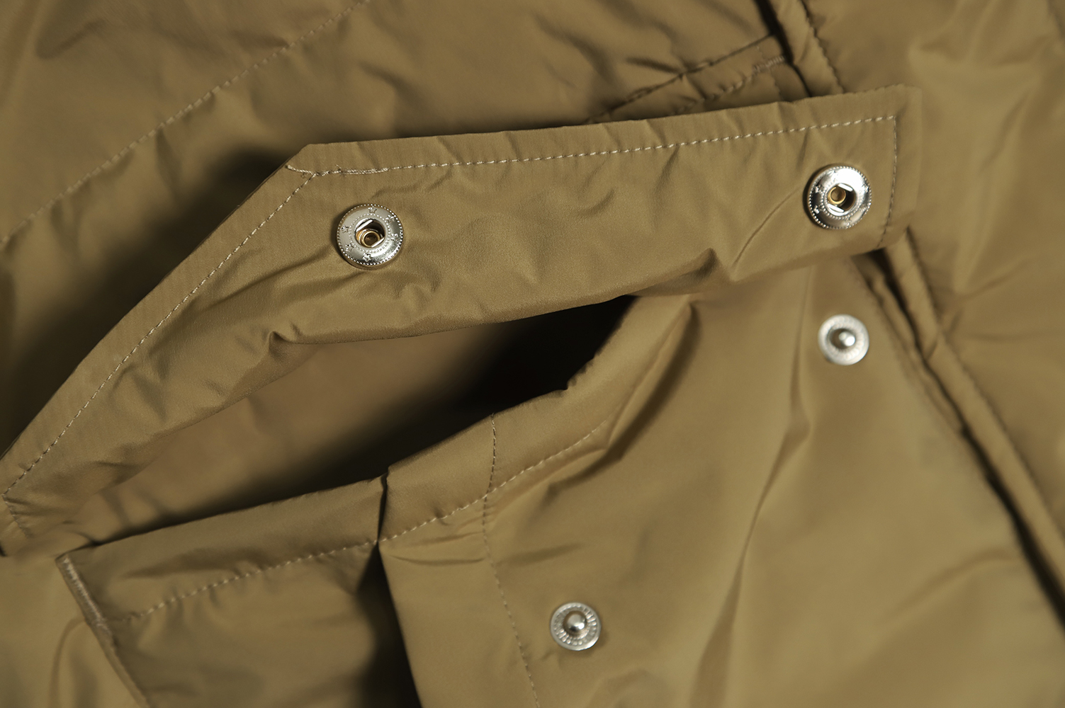 New Balance solid color down jacket with large pockets