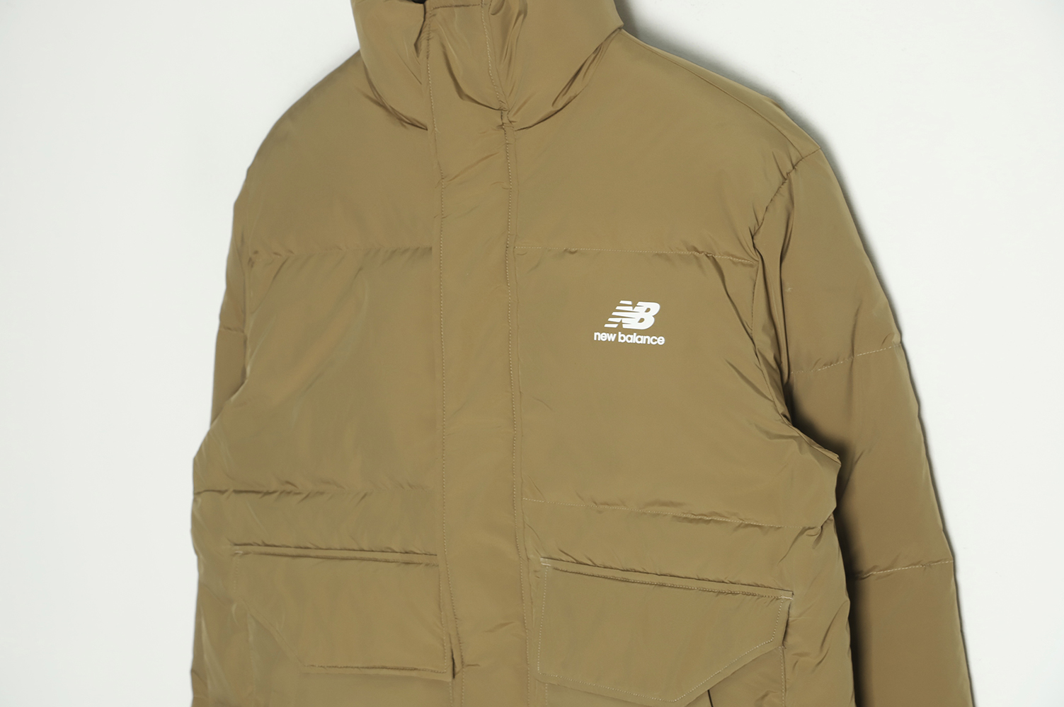 New Balance solid color down jacket with large pockets