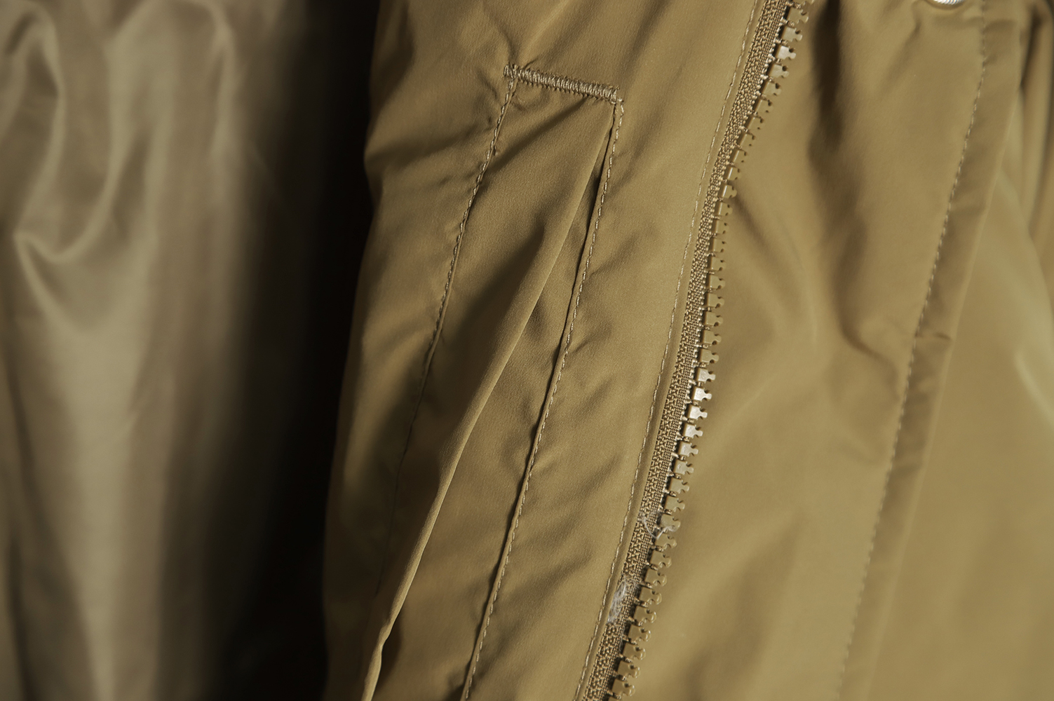 New Balance solid color down jacket with large pockets