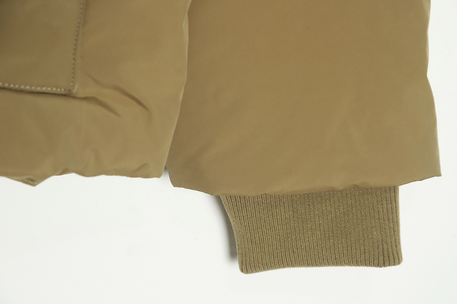 New Balance solid color down jacket with large pockets