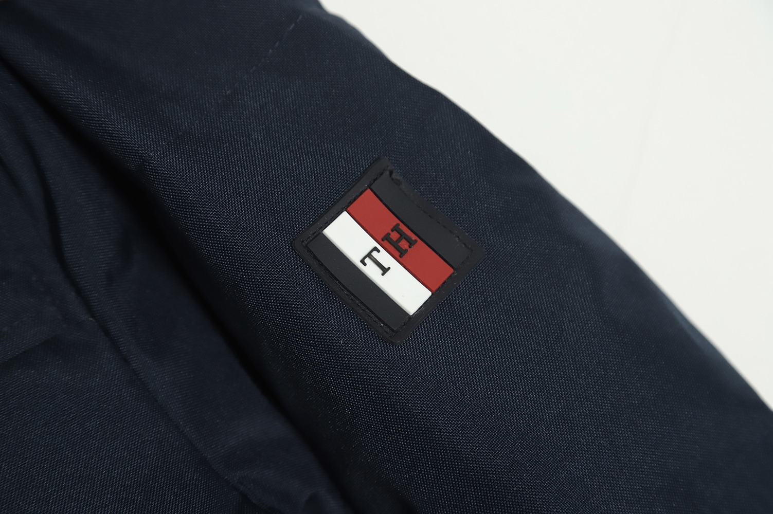 Tommy Hilfiger Rubberized Logo Drawstring Down Jacket