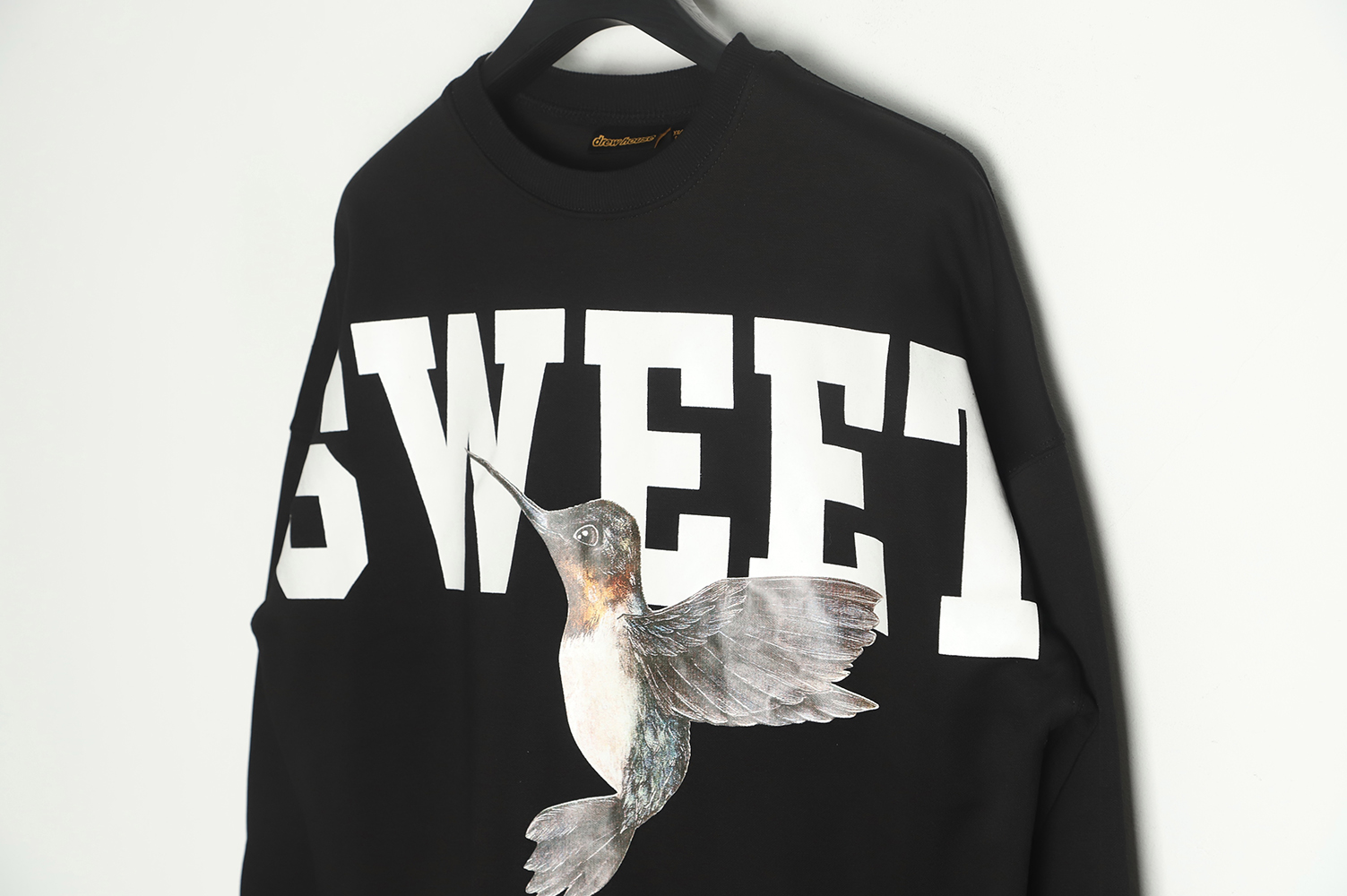 DREW House 2022 A/W black hummingbird print thin fleece sweater