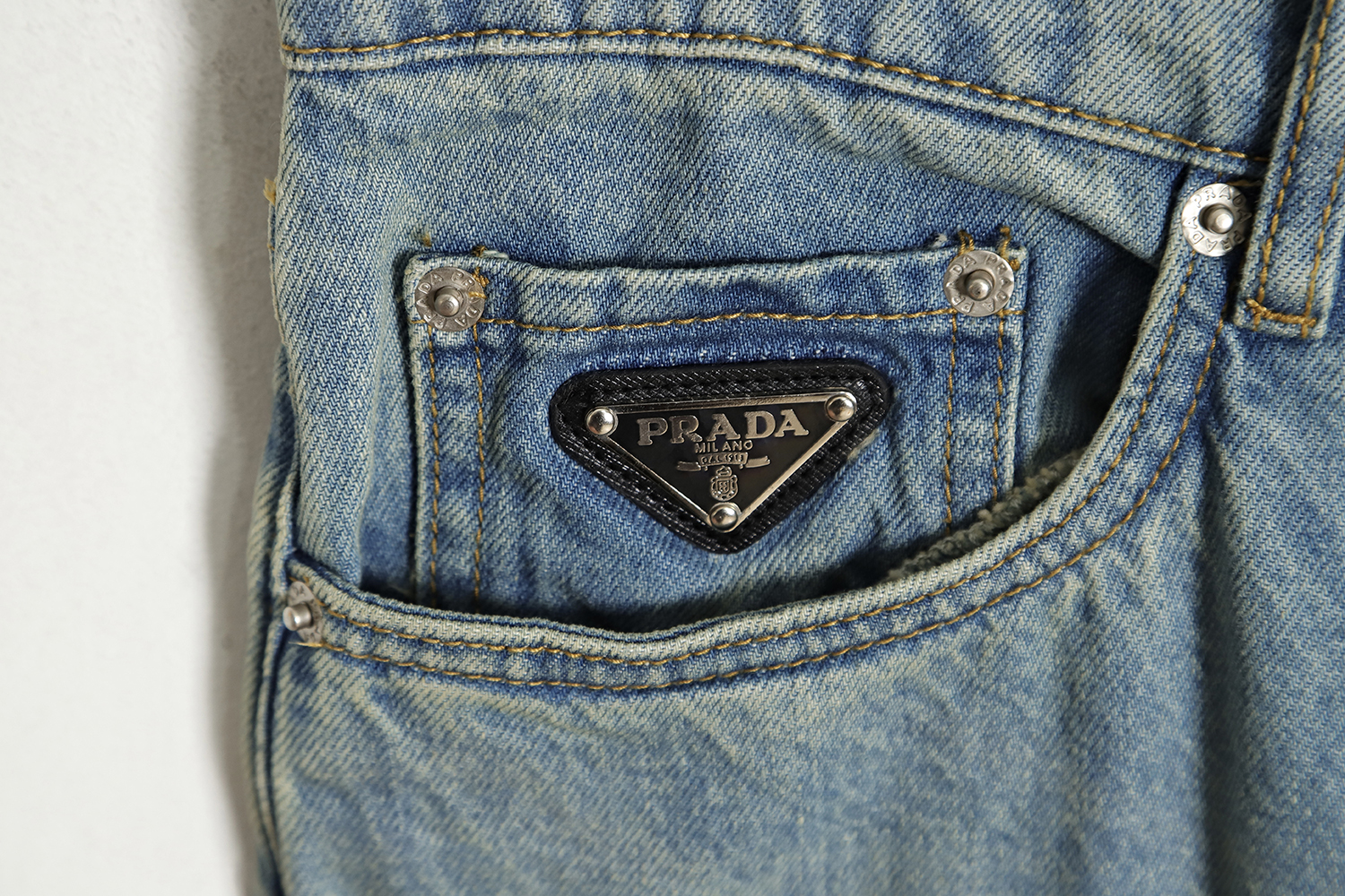 Prada 23SS Triangle Logo Washed Jeans
