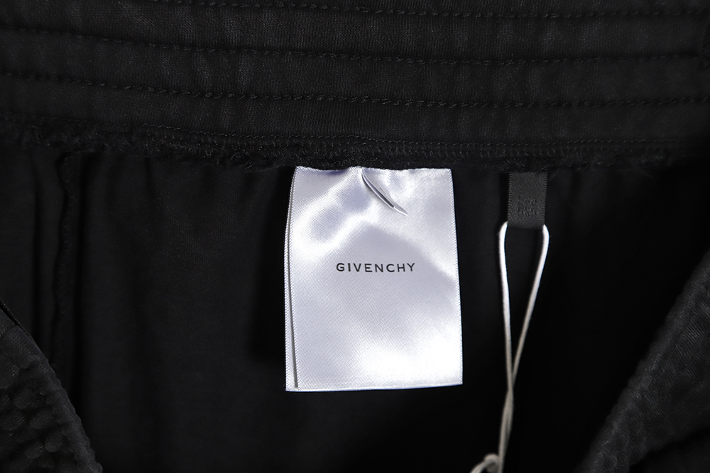 Givenchy 23SS ripped print fake two-piece shorts