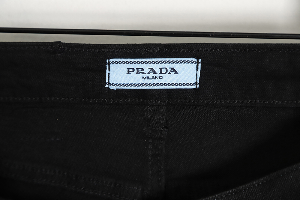 PRADA triangle logo jeans