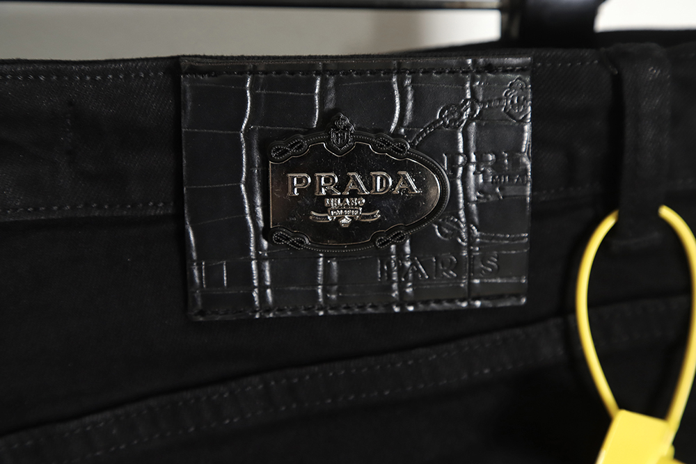 PRADA triangle logo jeans