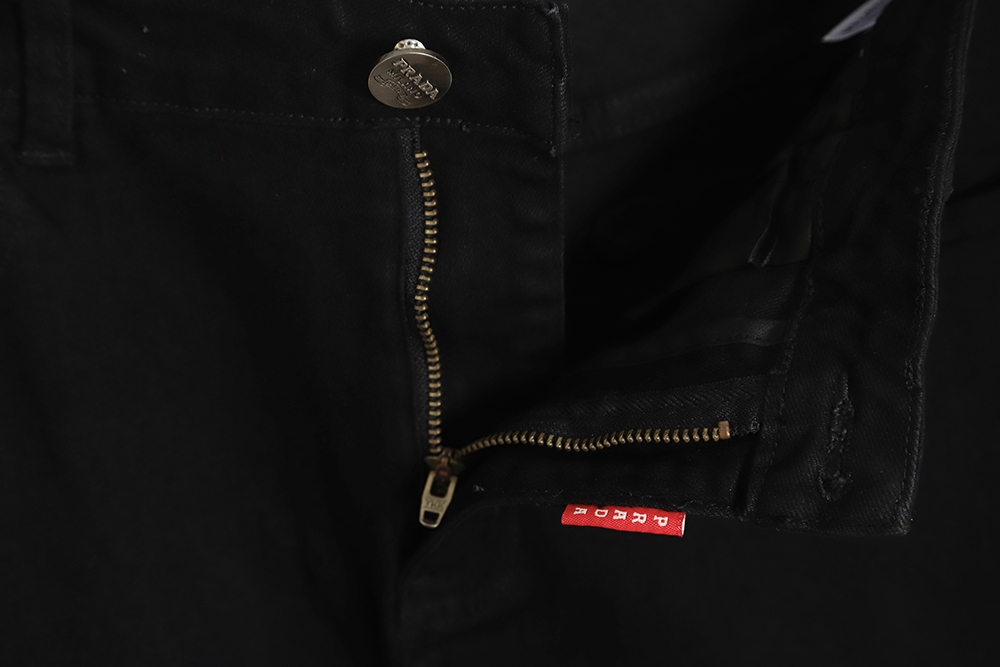 PRADA triangle logo jeans