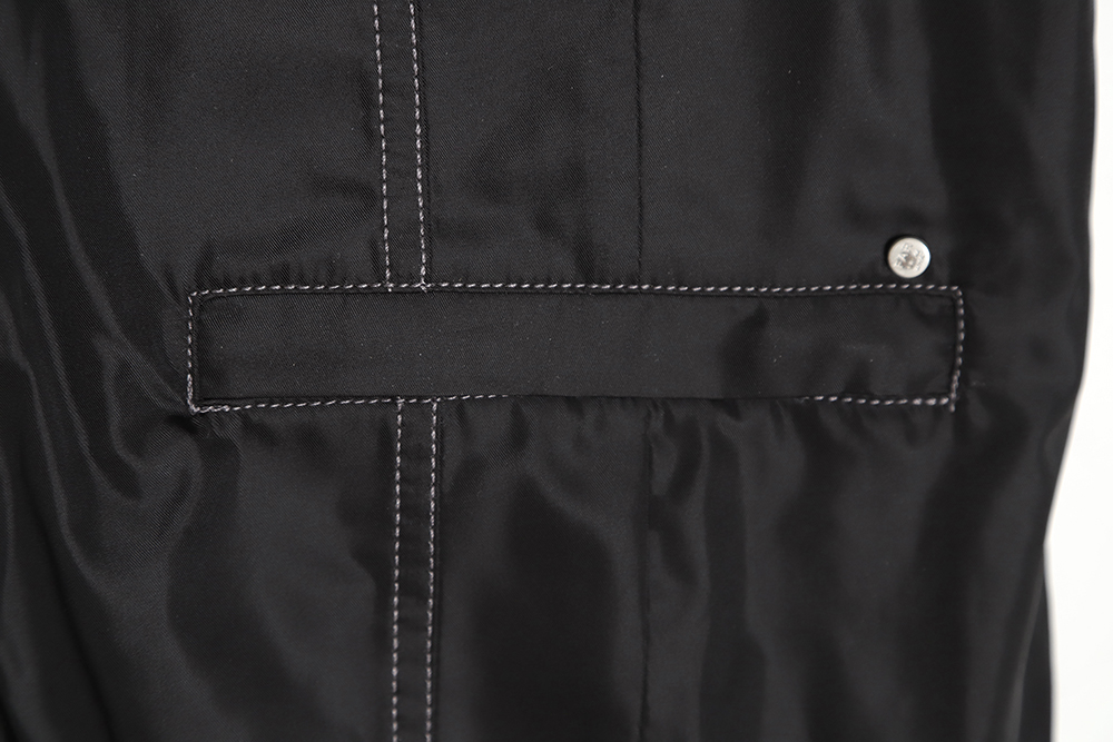 Far archive laminated zip trousers