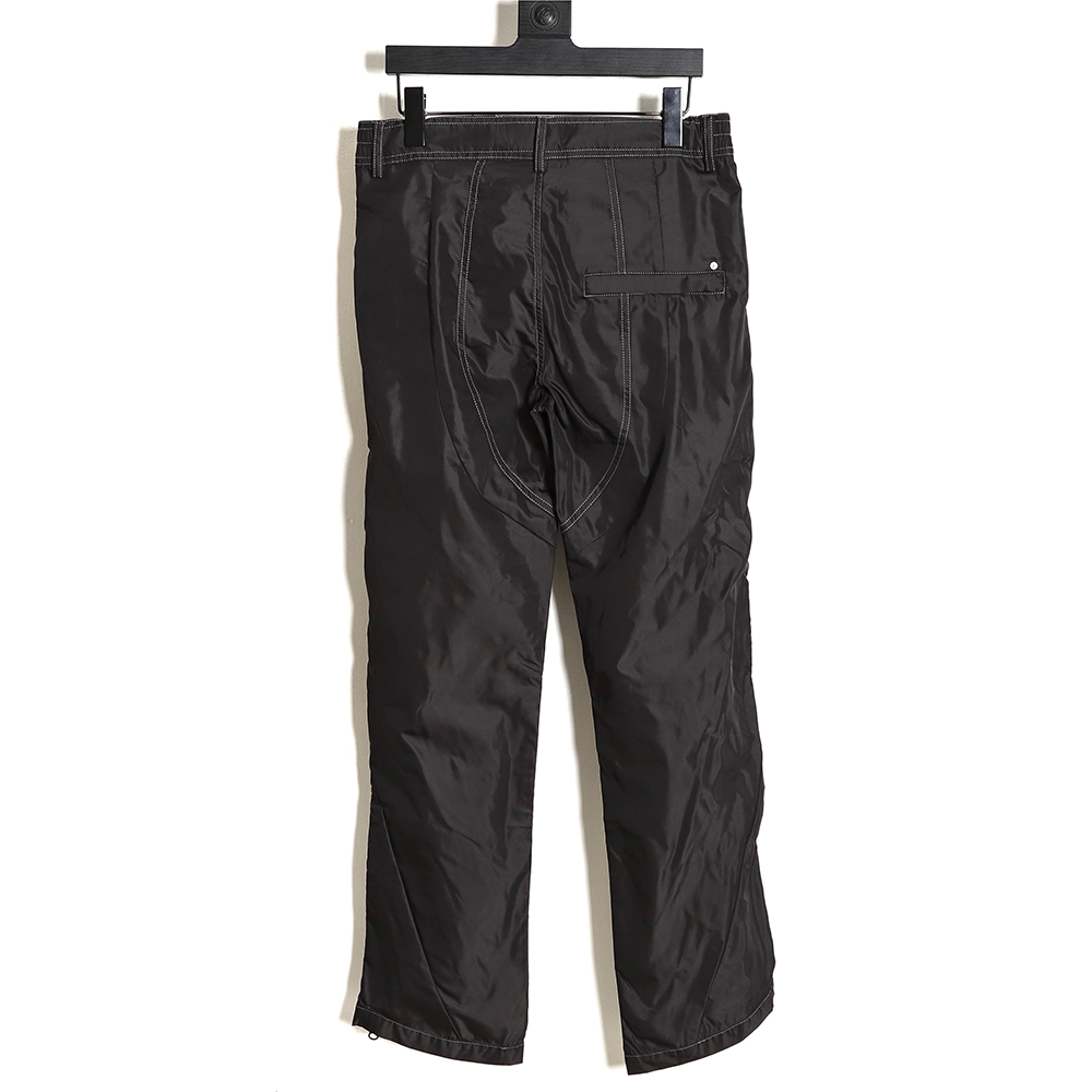 Far archive laminated zip trousers
