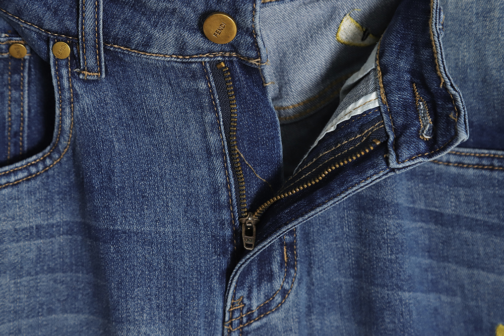 FENDI Monsters embroidered denim trousers