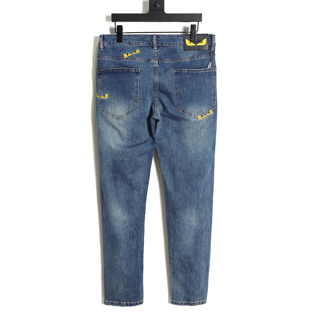 FENDI Monsters embroidered denim trousers