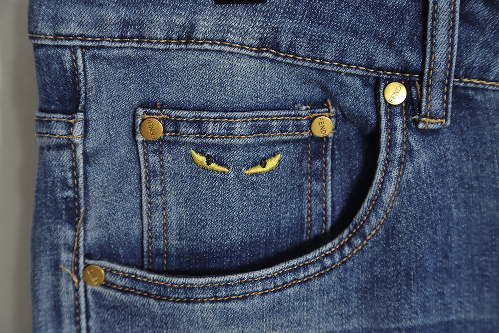FENDI Monsters embroidered denim trousers