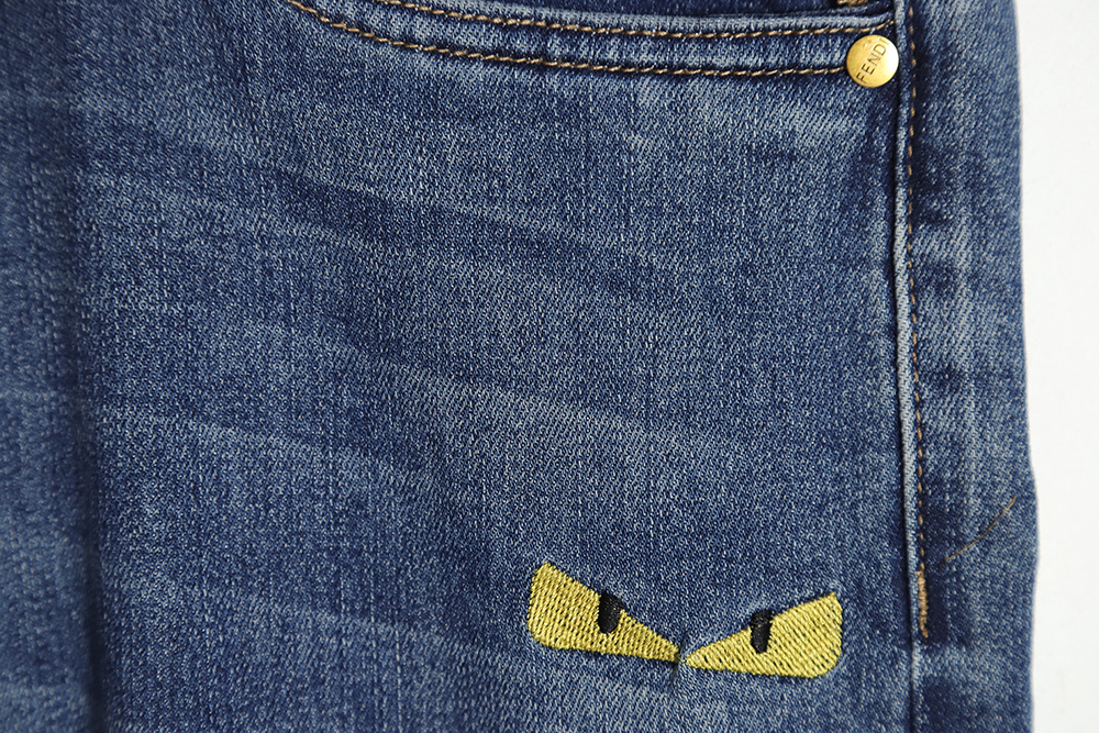 FENDI Monsters embroidered denim trousers