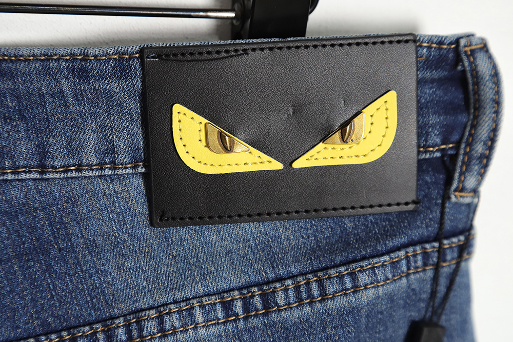 FENDI Monsters embroidered denim trousers