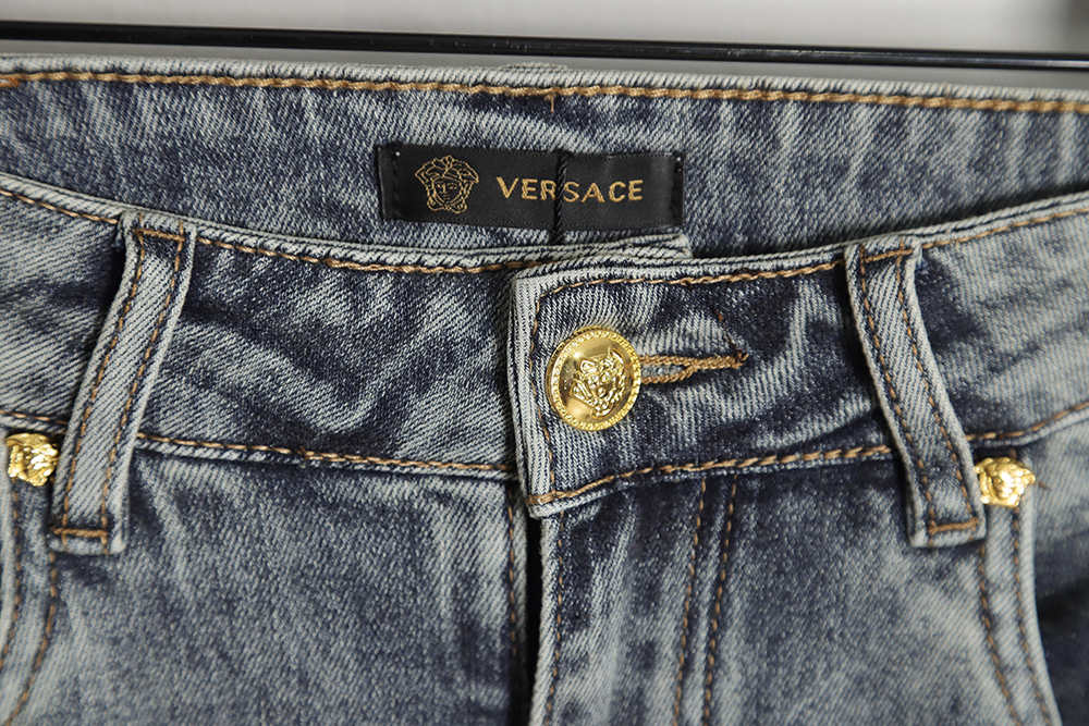 Versace Versace back portrait embroidered denim trousers