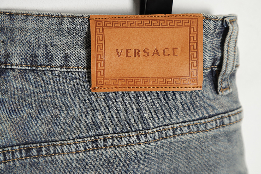 Versace Versace back portrait embroidered denim trousers