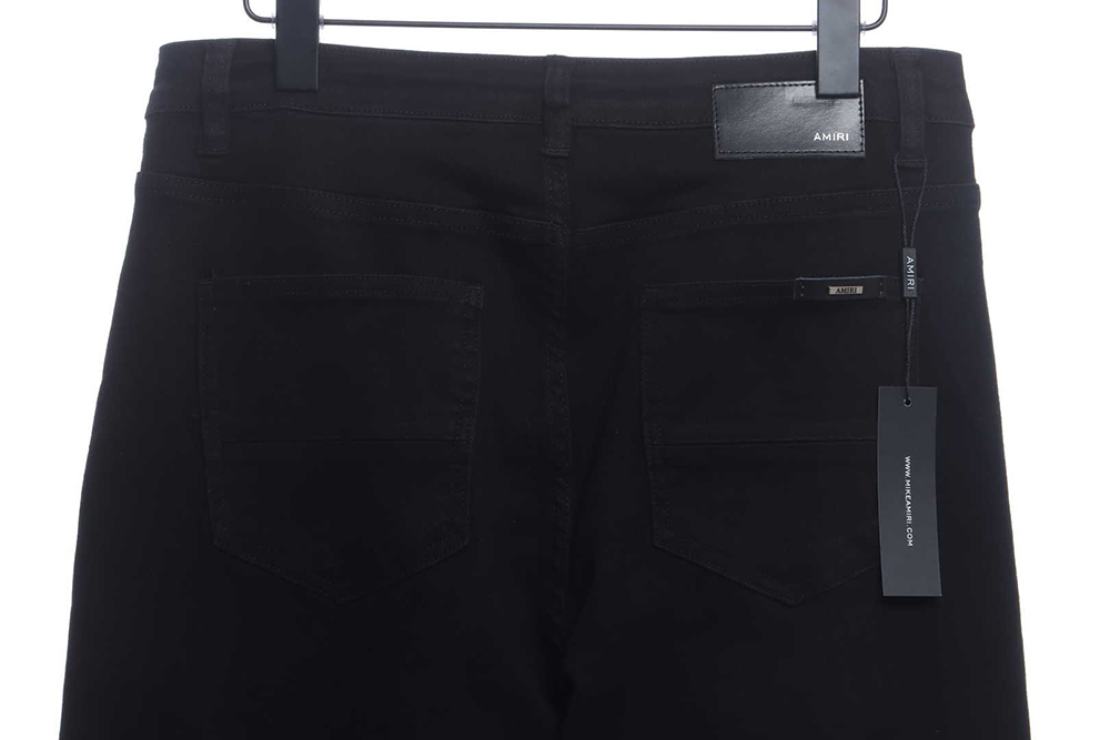 AMIRI MX1 zip-up washed stretch-denim trousers