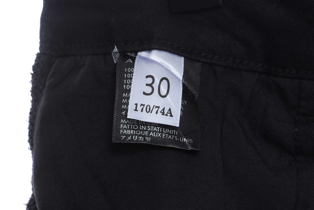 AMIRI MX1 zip-up washed stretch-denim trousers