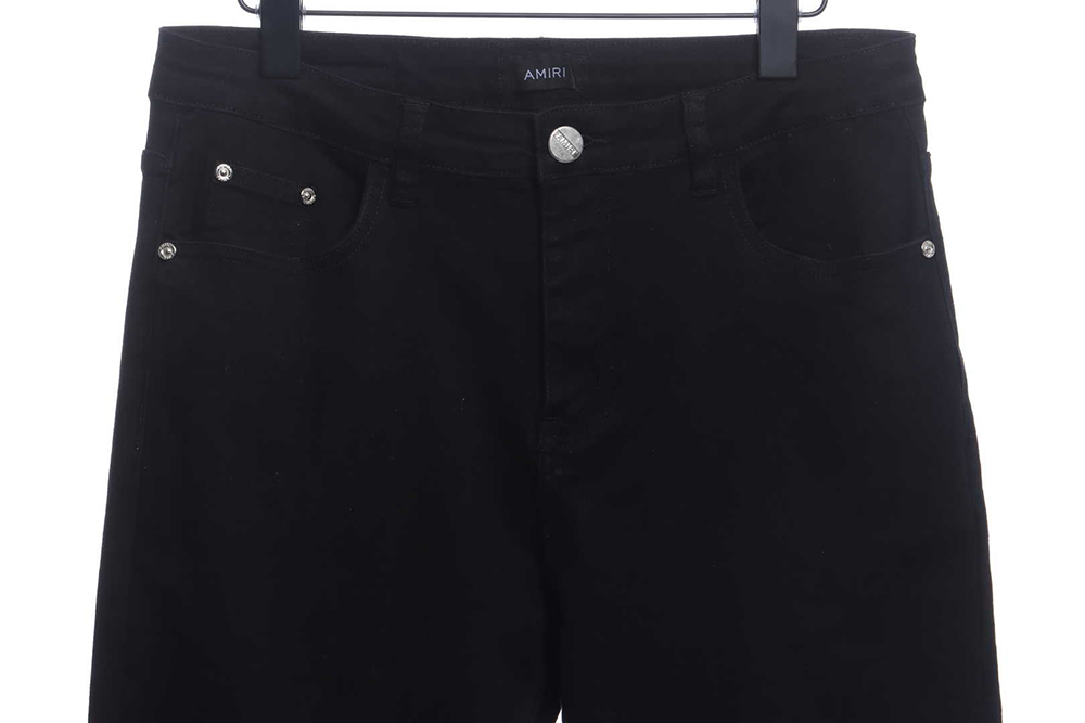 AMIRI MX1 zip-up washed stretch-denim trousers