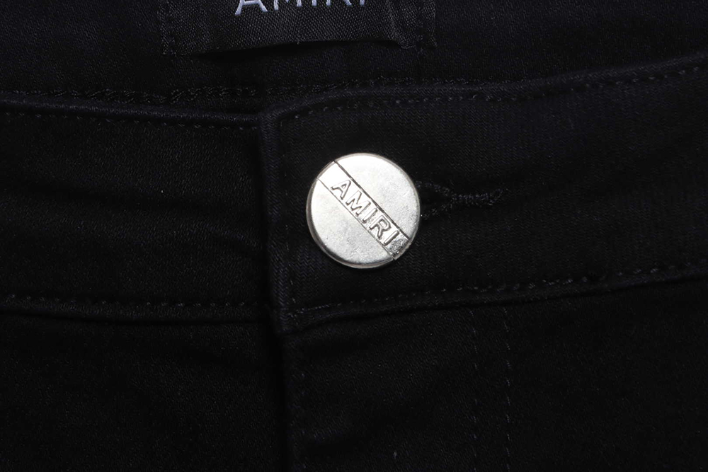 AMIRI MX1 zip-up washed stretch-denim trousers