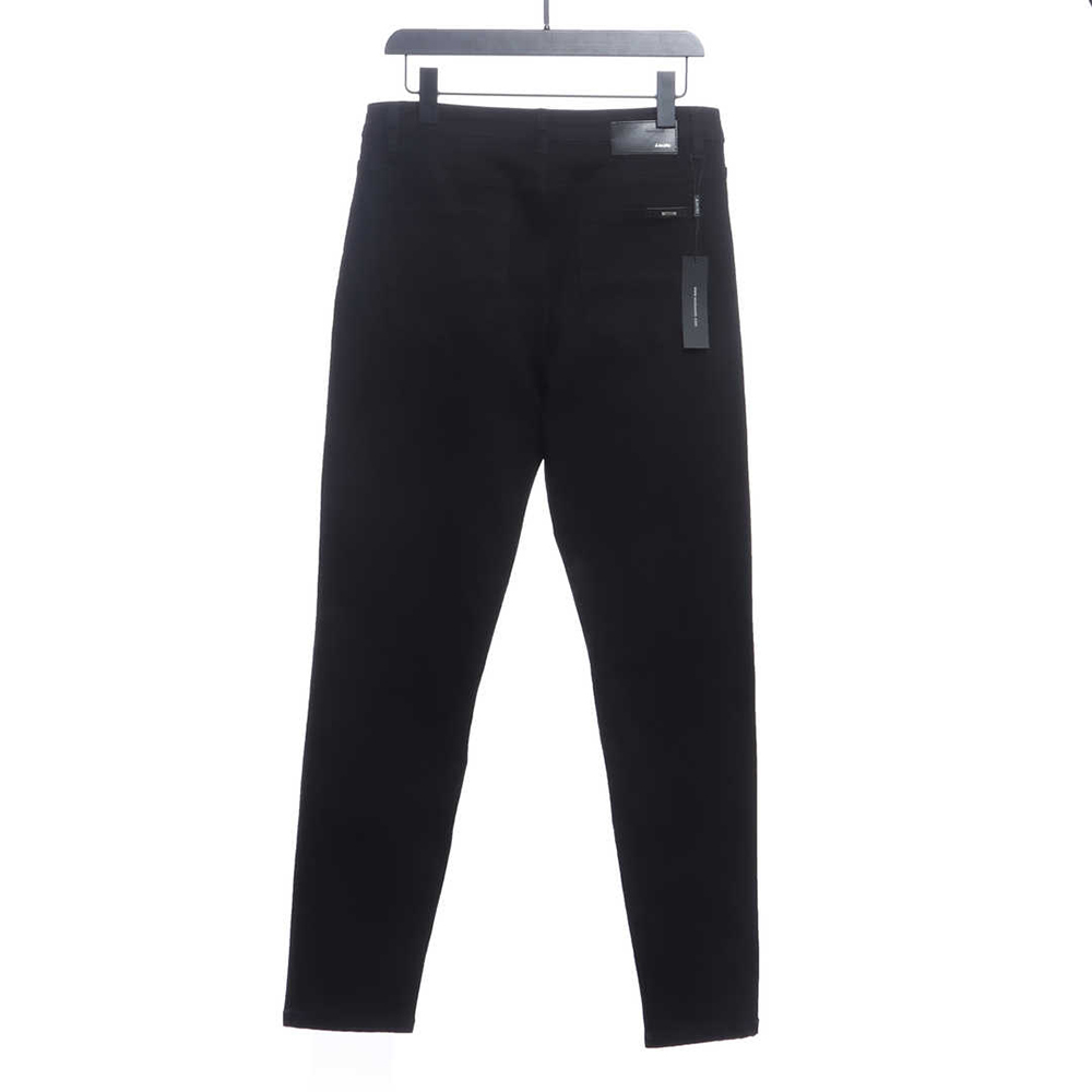 AMIRI MX1 zip-up washed stretch-denim trousers