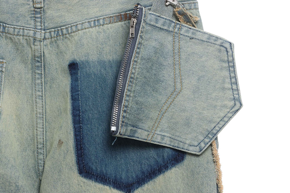 Margiela distressed belt bag denim trousers