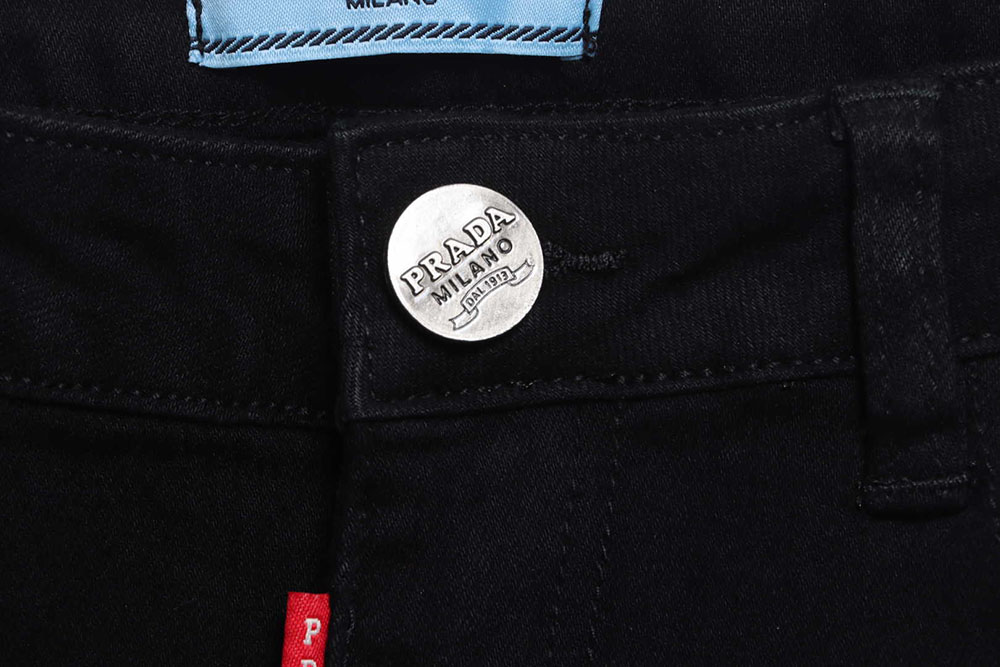 Prada triangle denim trousers