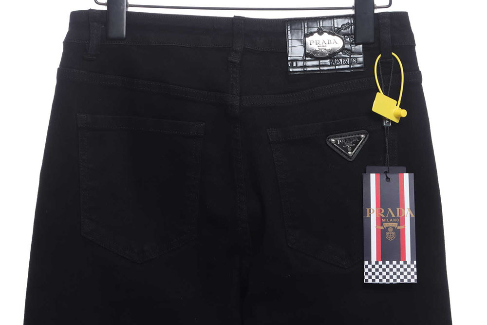 Prada triangle denim trousers