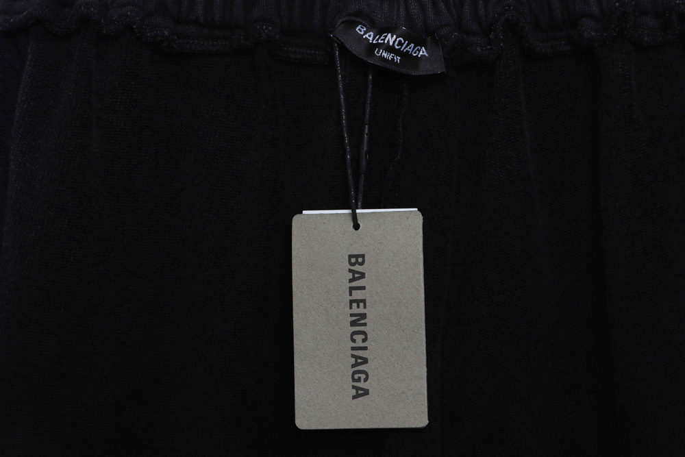 Balenciaga tape-print ripped shorts