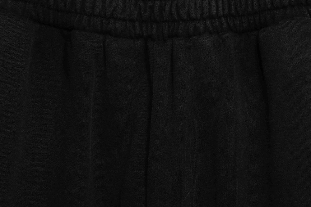 Balenciaga tape-print ripped shorts
