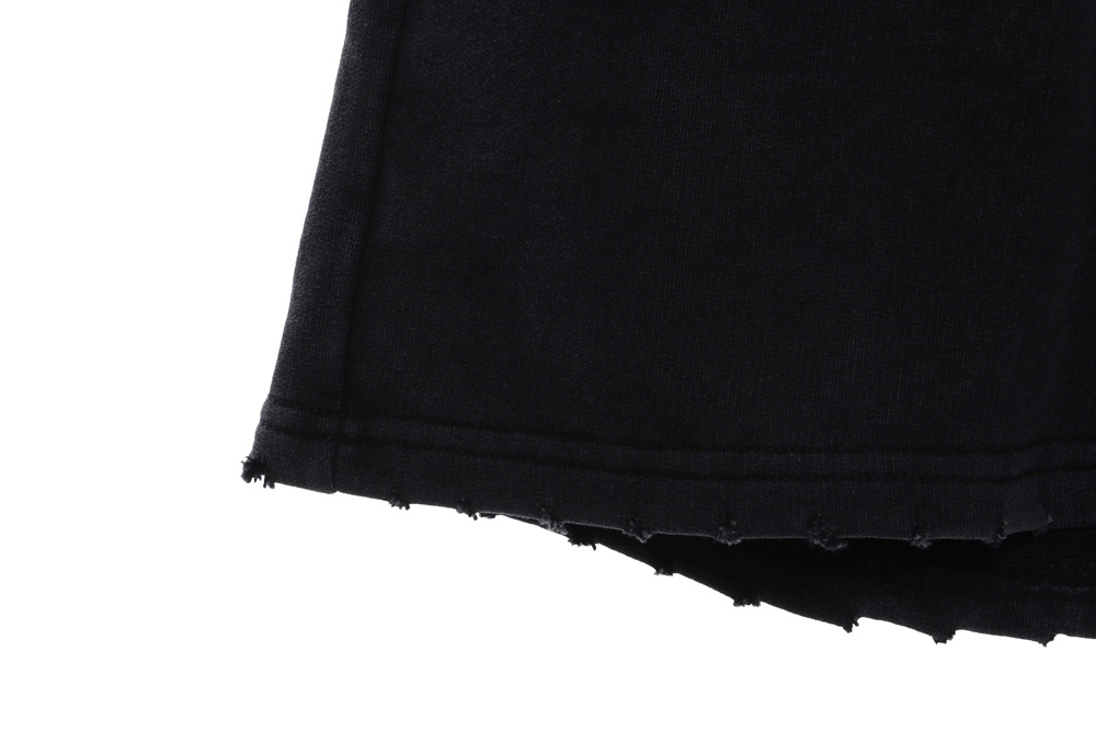 Balenciaga tape-print ripped shorts