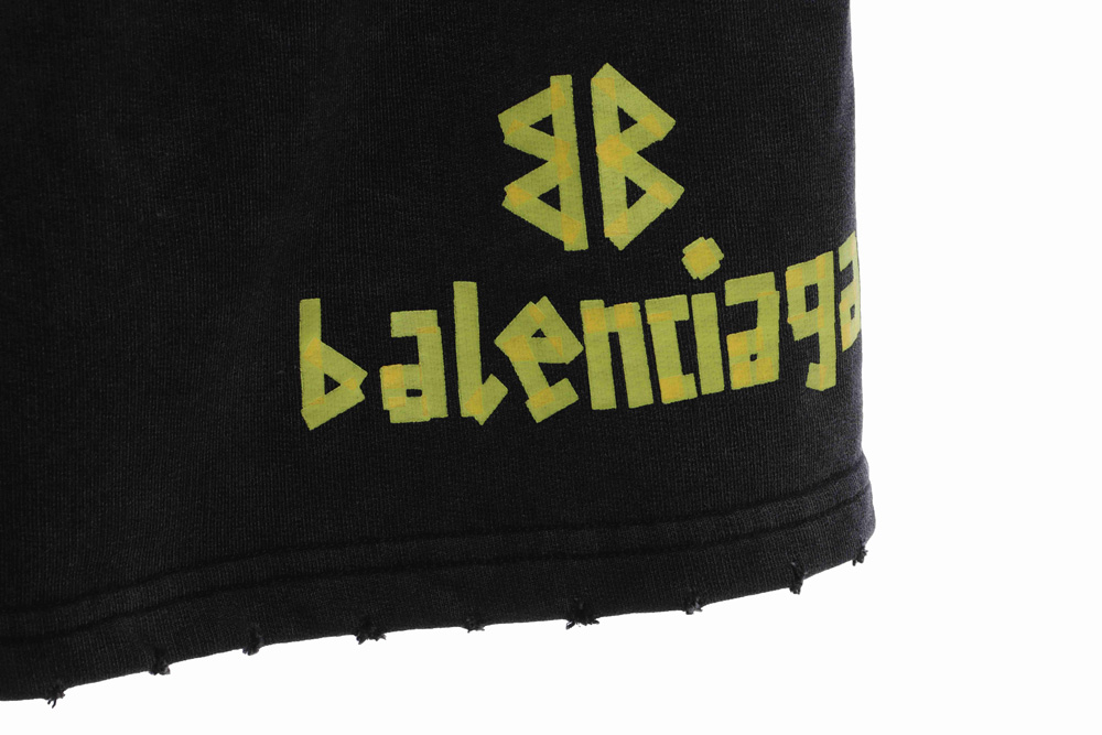 Balenciaga tape-print ripped shorts