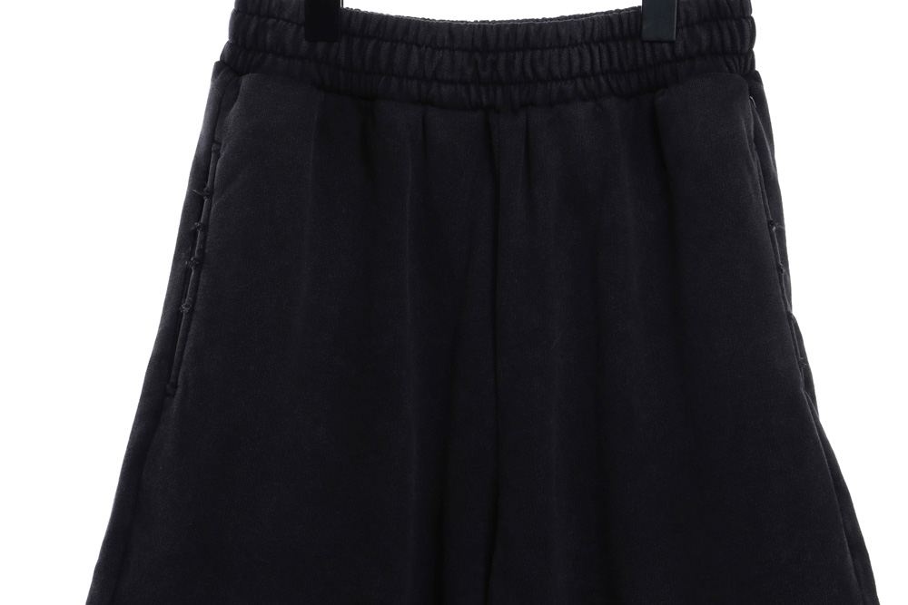 Balenciaga tape-print ripped shorts