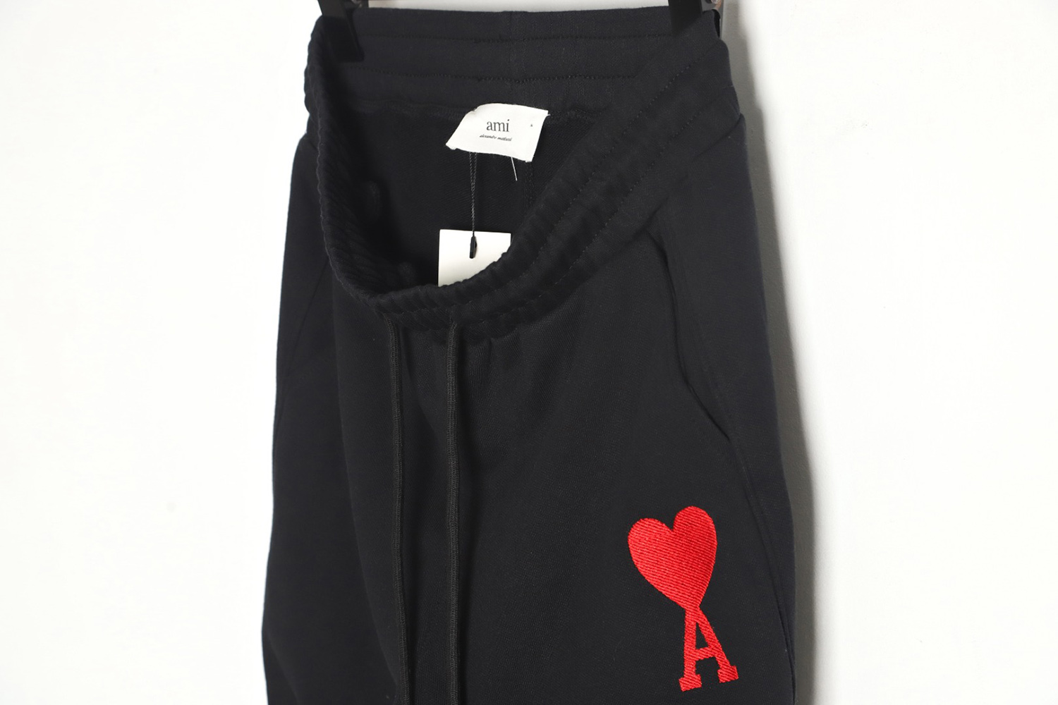 Ami Paris embroidered hearts trousers