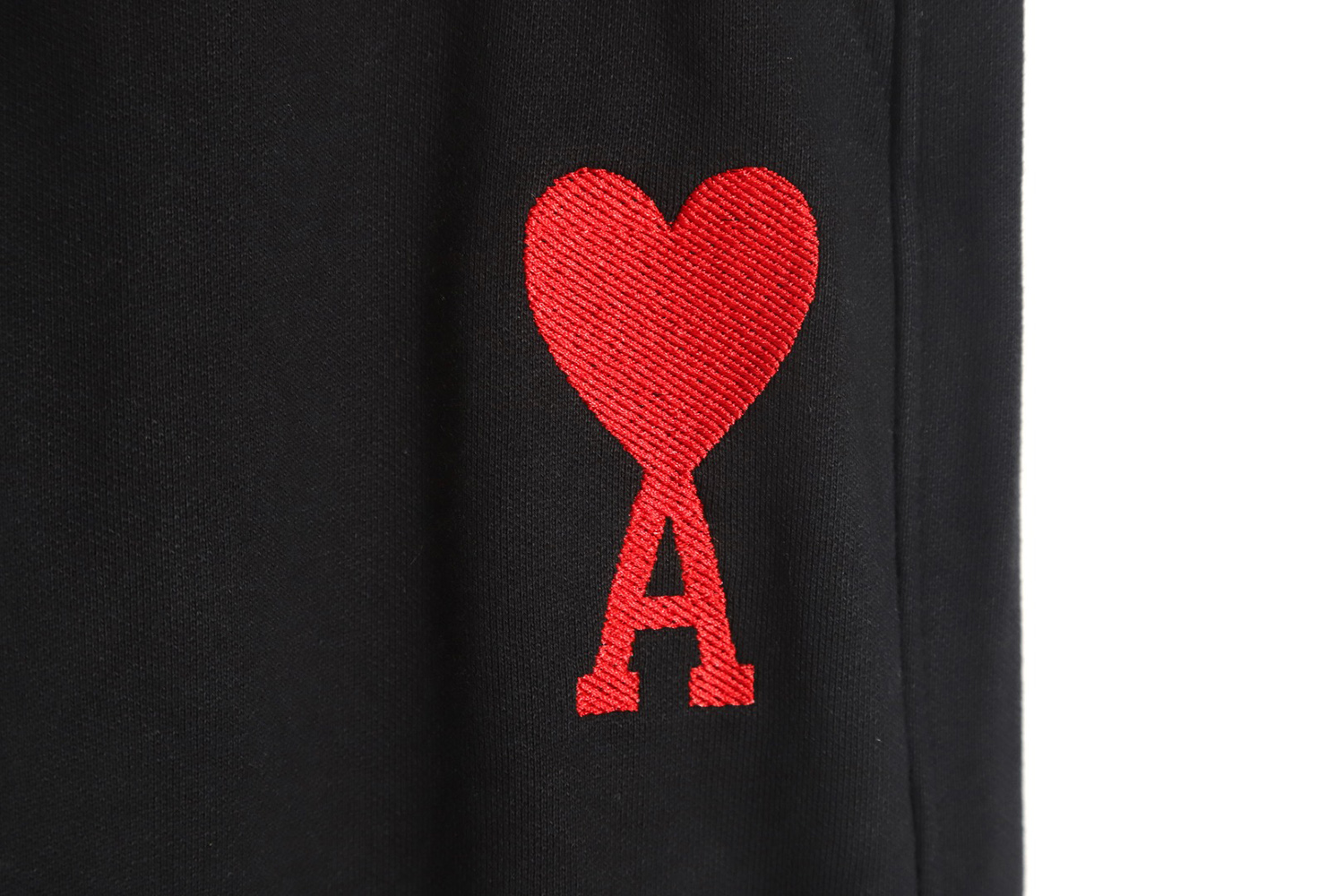 Ami Paris embroidered hearts trousers