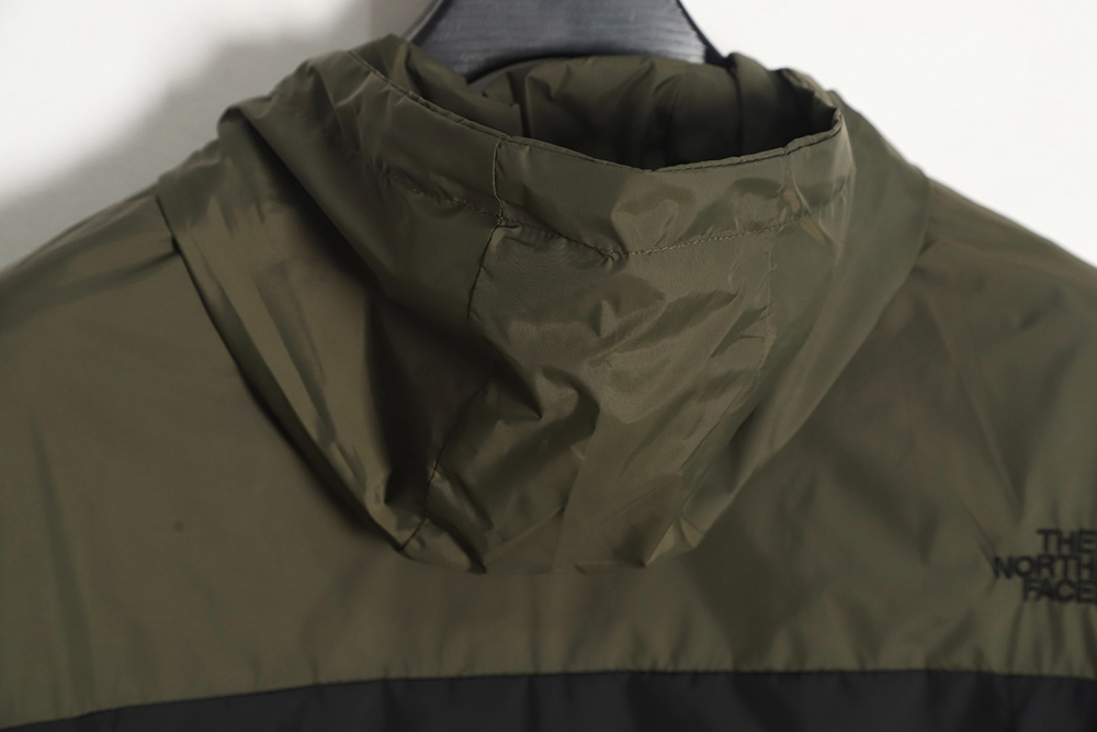 The North Face 23SS color block hooded windbreaker jacket