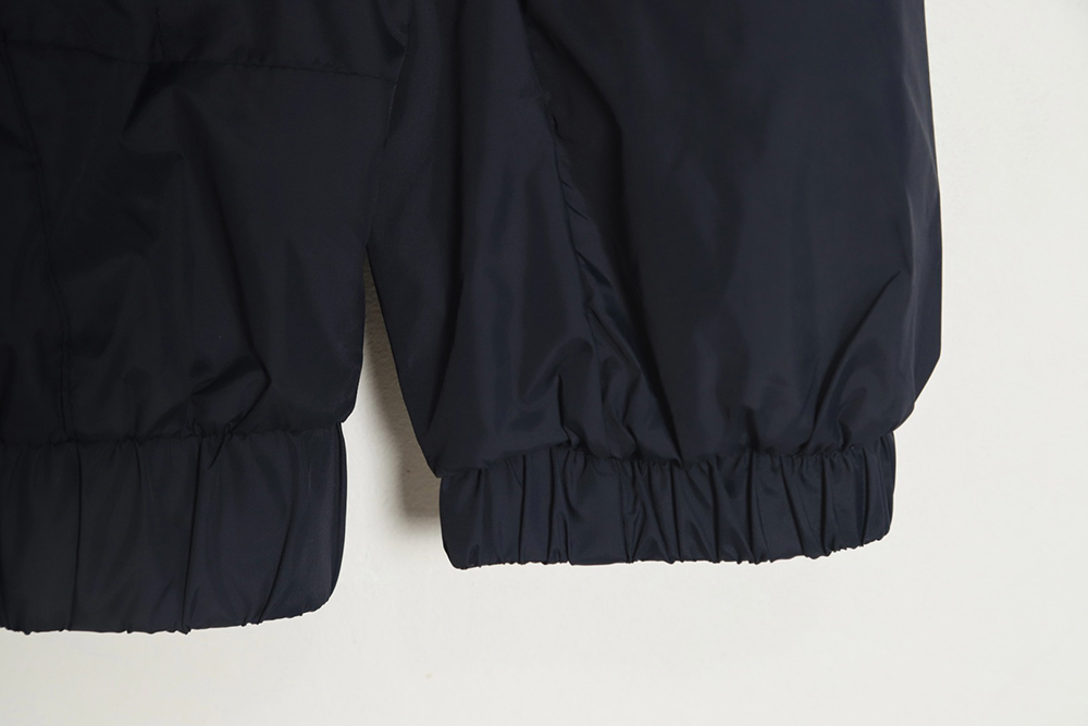 The North Face 23SS color block hooded windbreaker jacket