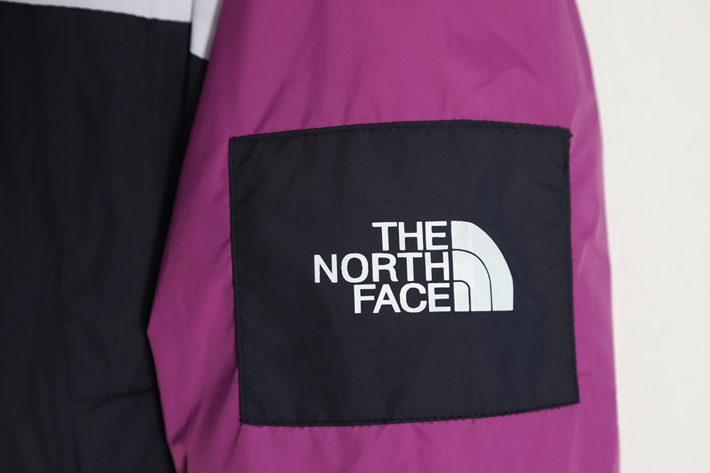 The North Face 23SS color block hooded windbreaker jacket