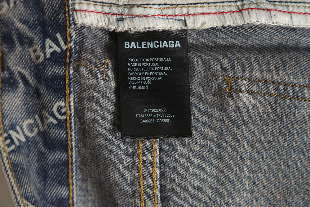 Balenciaga 23Fw all over printed washed denim trousers