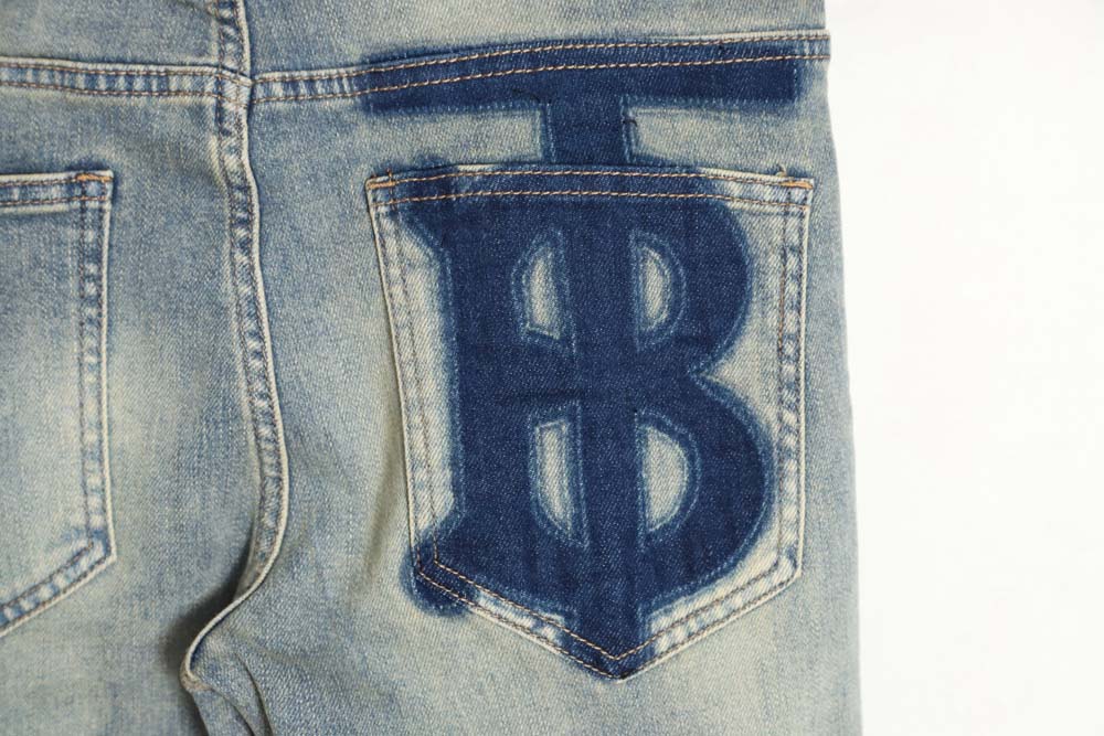 Burberry TB print pocket jeans on the back