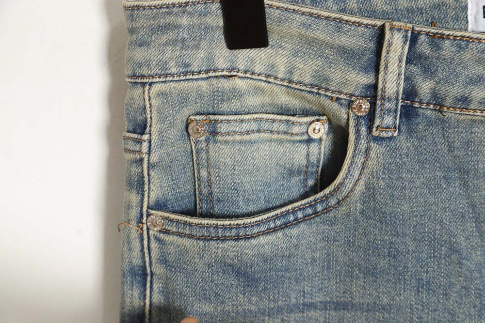 Burberry TB print pocket jeans on the back