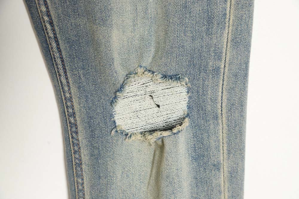 Burberry TB print pocket jeans on the back