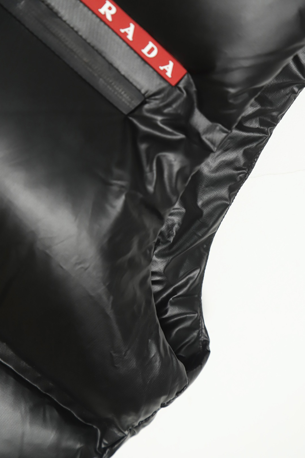 Prada red stripe logo down vest